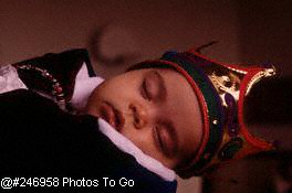 Sleeping baby in Halloween costume